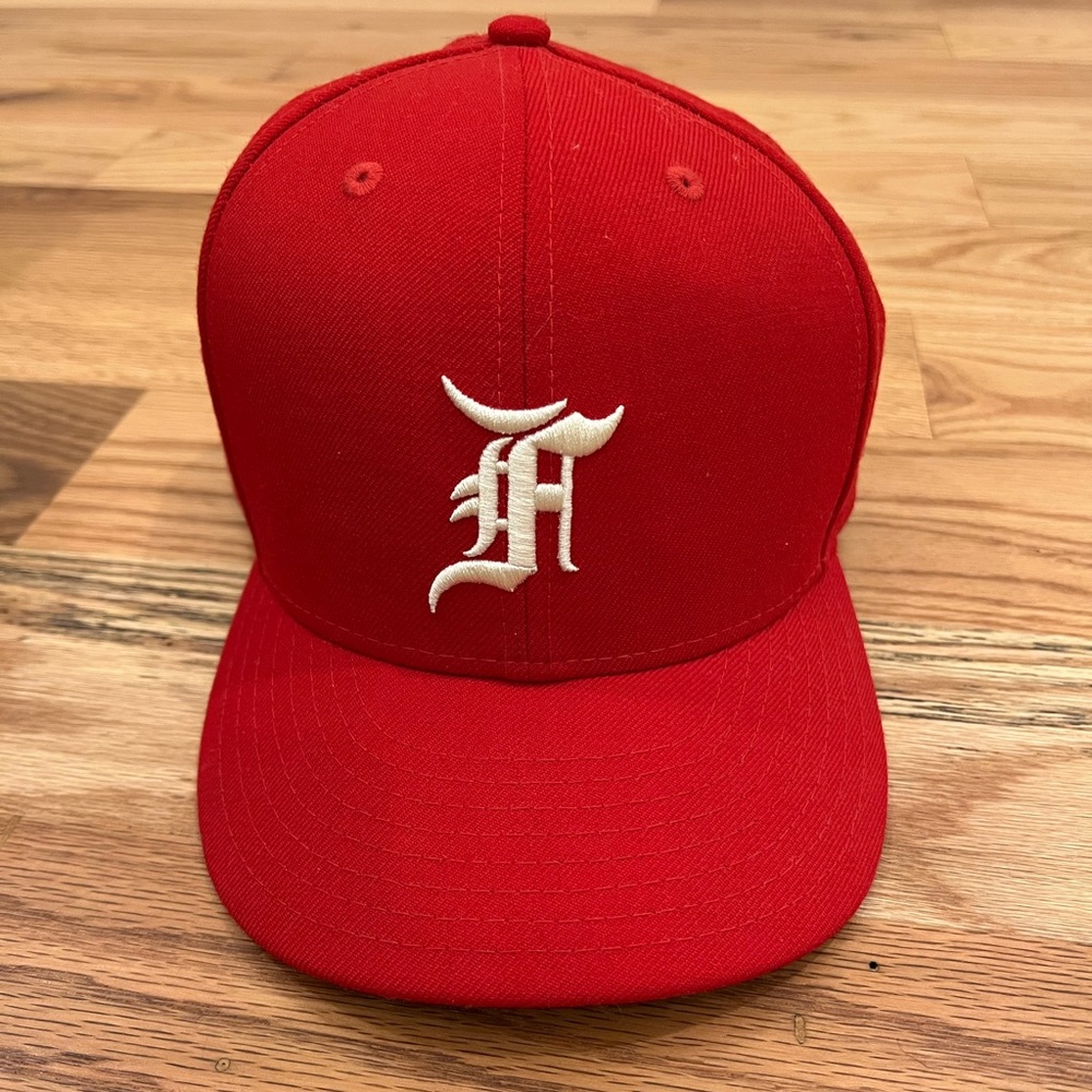 Fear of God Essentials new era fitted hat. Royal red